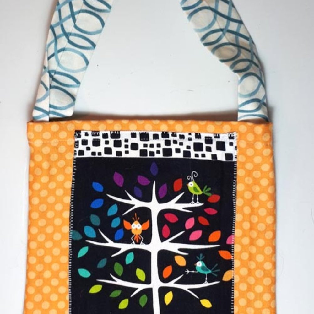 Handcrafted everlasting gift bag with tree applique. 100% cotton